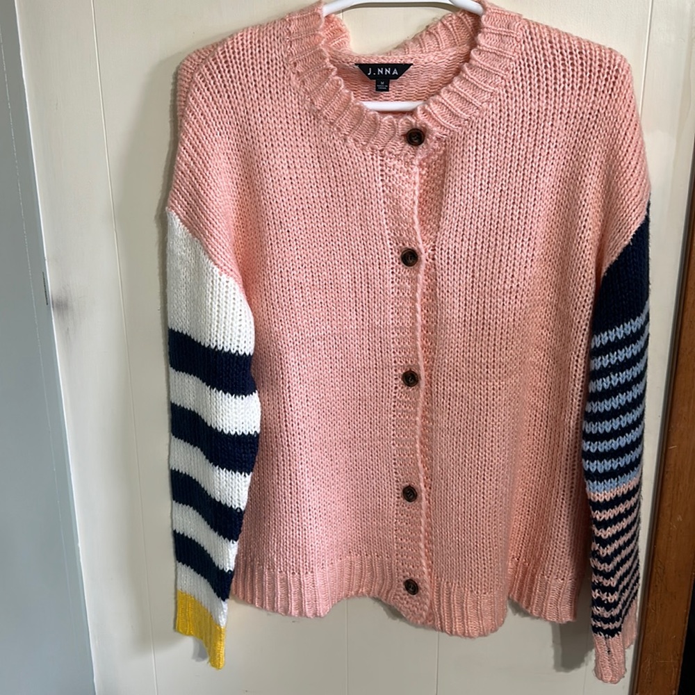 J.NNA sweater. Super cute w/ multi colored sleeves. Size Medium-fits oversized